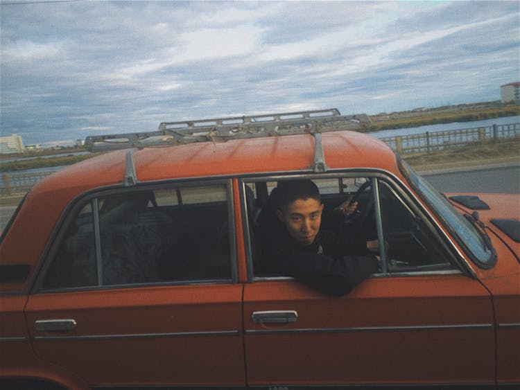 Man Posing In Fiat 126p