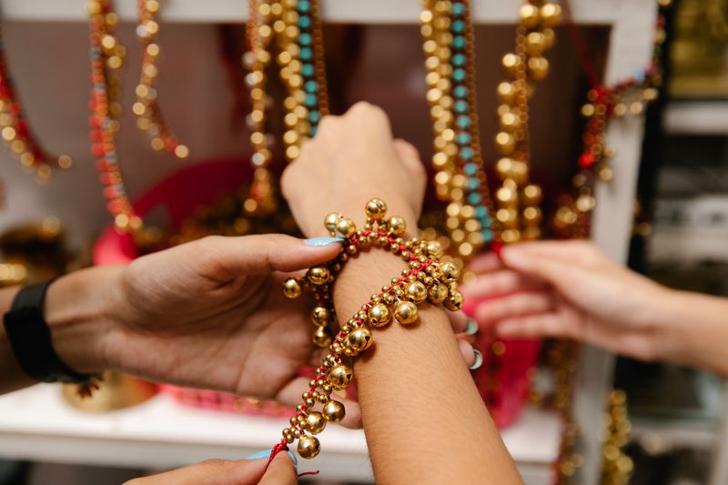 Vibrant gold and red beaded bracelet, reference style