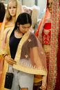 Woman in Yellow and White Sari
