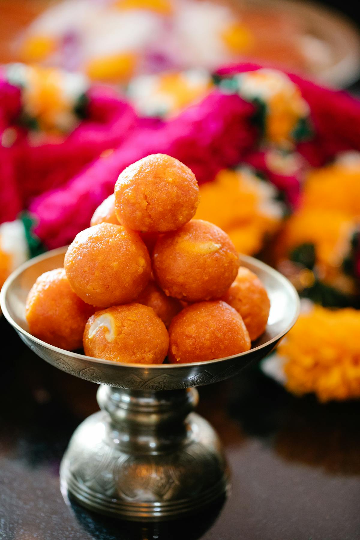 Fresh laddoo tower in silver pedestal