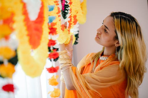 Woman Looking at Garlands