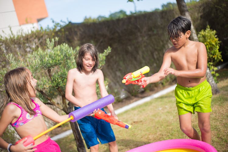 Children Playing Water Guns