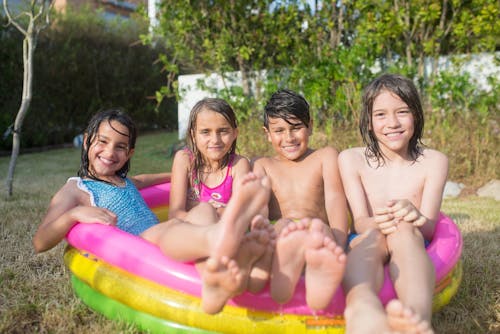 Free Children on the Inflatable Pool Stock Photo