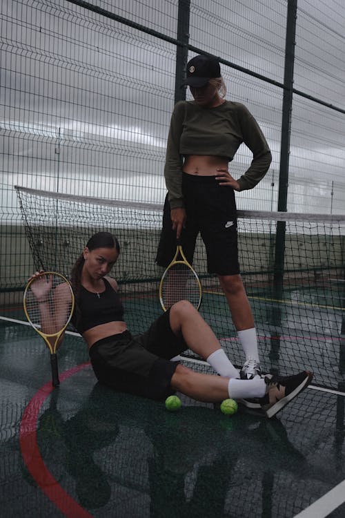 Women with Tennis Rackets
