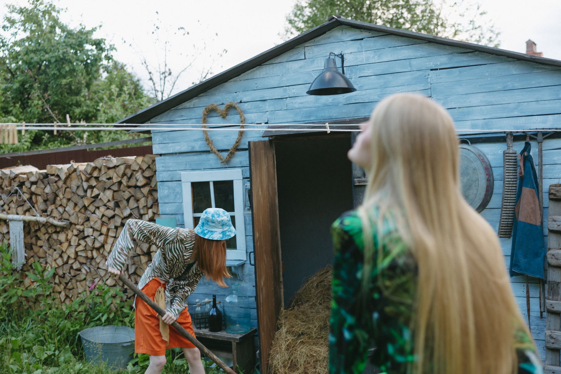 Women Doing Gardening at the Backyard