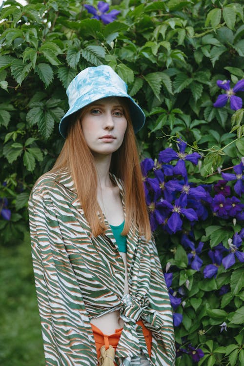 A Woman Wearing Blue Bucket Hat