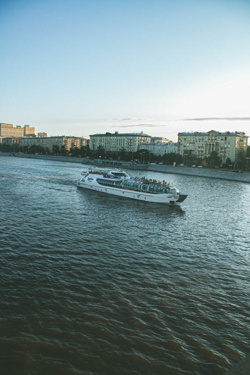 Ferry Leaving a City