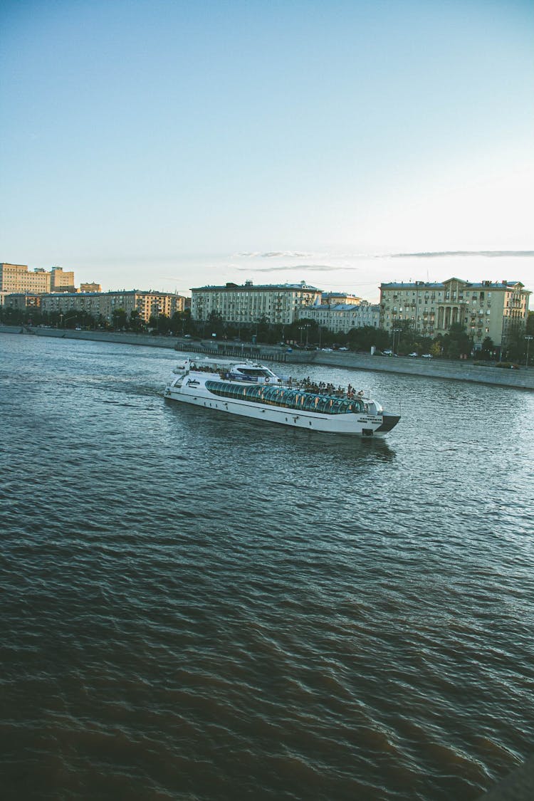 Ferry Leaving A City