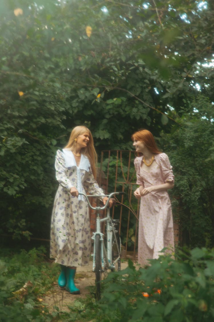 Women Walking In The Garden