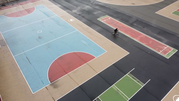 Aerial shot of vibrant sports courts in Brooklyn, ideal for urban recreation and leisure activities.