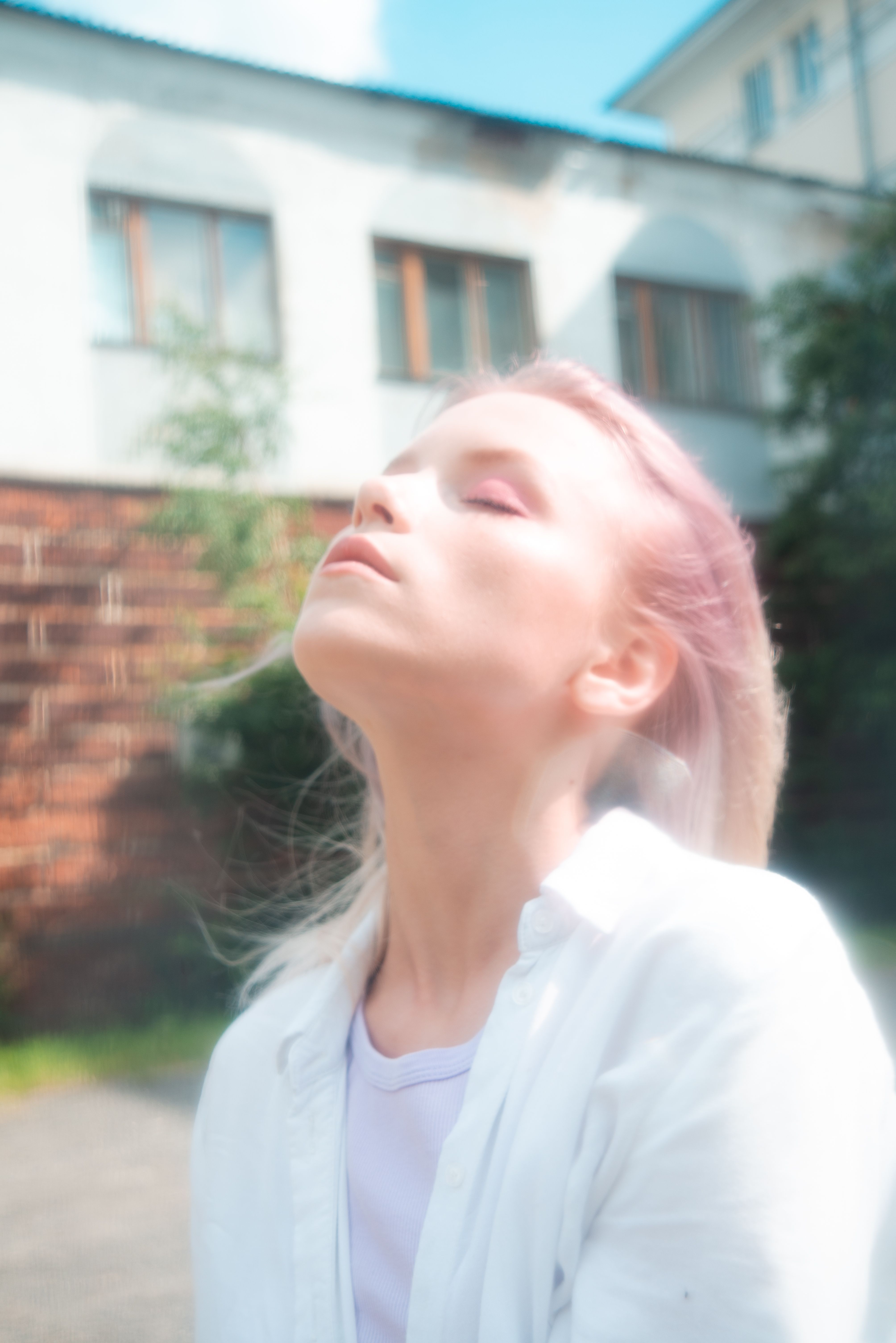 Portrait of a Woman with her Eyes Closed · Free Stock Photo