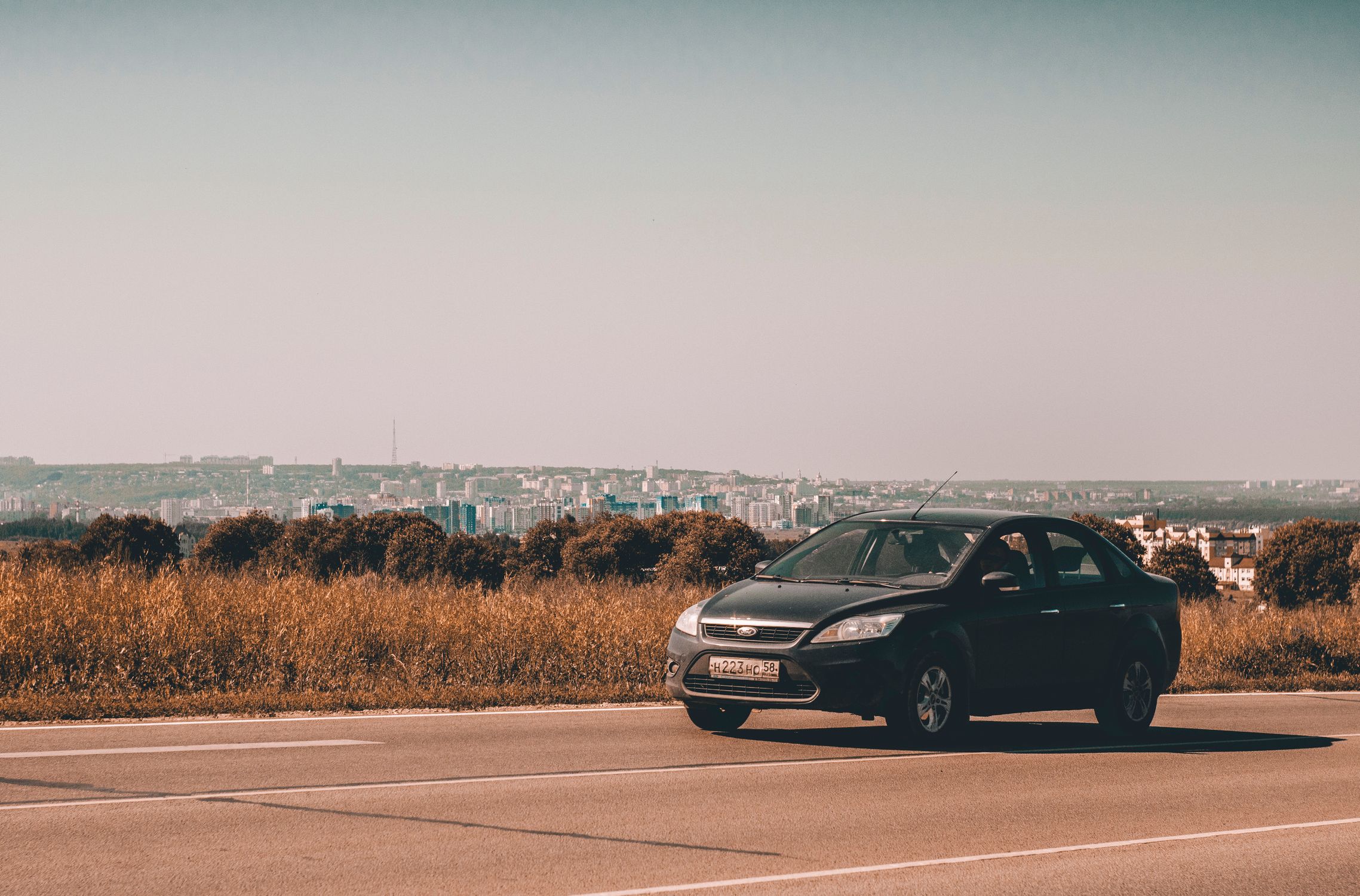 A Car on the Road · Free Stock Photo
