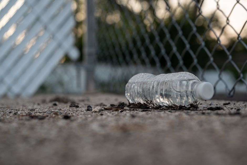 discarded plastic bottle street