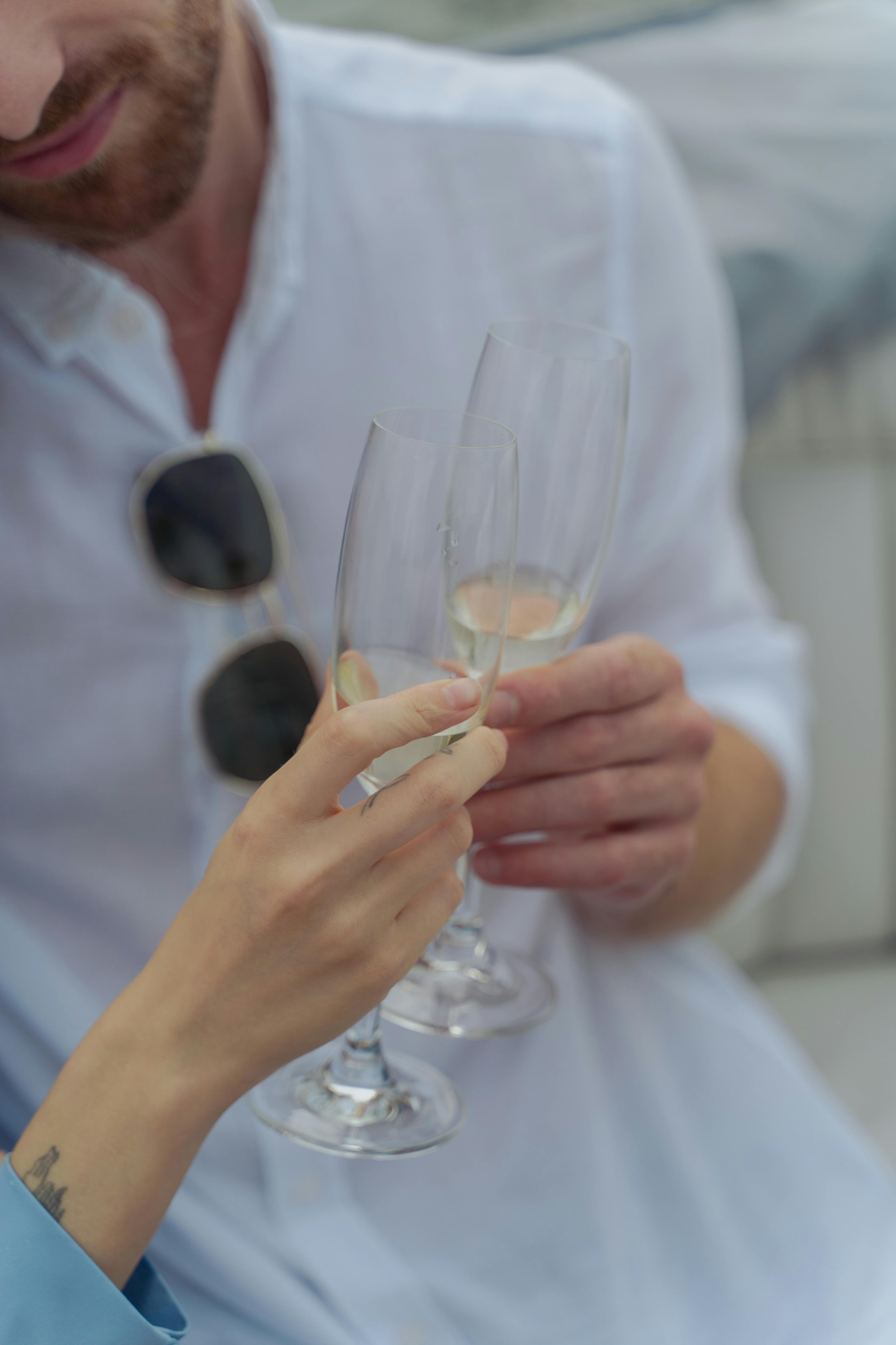 People holding glasses of champagne making a toast Stock Photo by ©dasha11  57270549