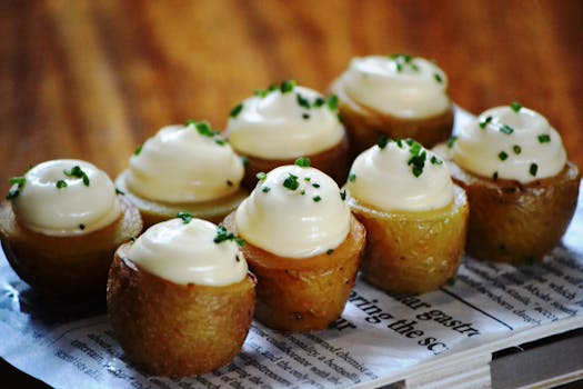 Delicious roasted potato bites topped with creamy sour cream and chives.