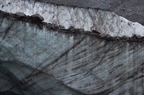 Snow Reflecting in an Icy River