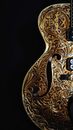 Stringed Musical Instrument With Carvings