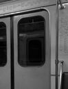 Grayscale Photo of Train Door