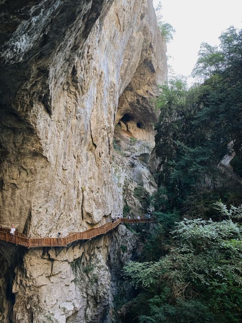 Free Explore the breathtaking wooden walkway carved into the rocky cliffs of Horma Canyon in Turkey. Stock Photo
