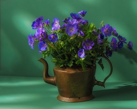 An Antique Brass Pot Use as a Flower Vase