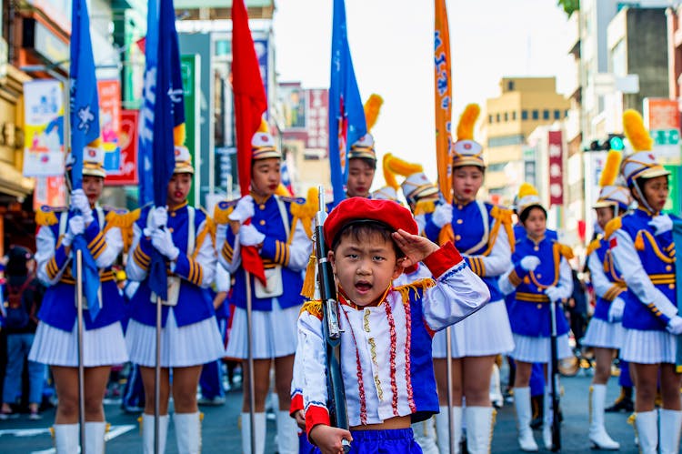 Child With Rifle On Parade