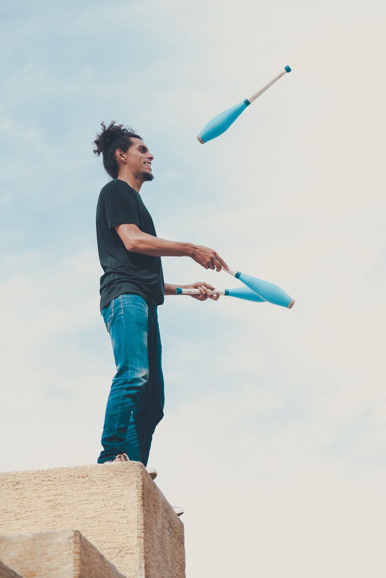 A Man Doing Juggling 