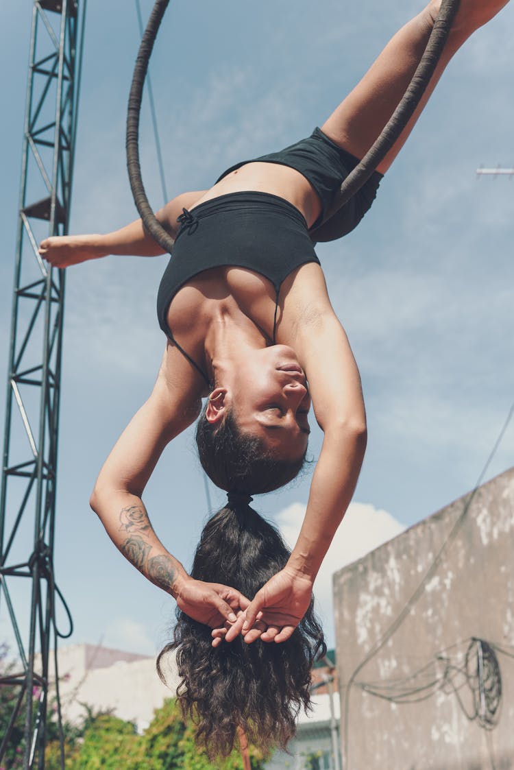 
A Woman Using An Aerial Hoop