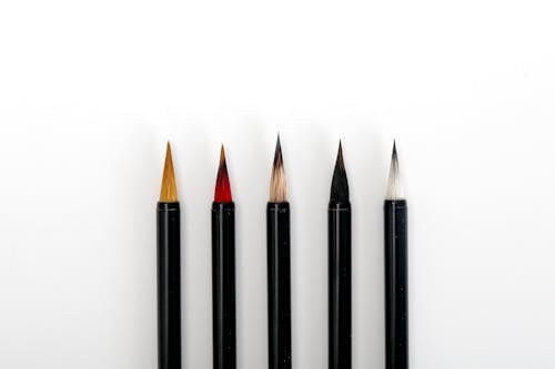 Free Black Pencil on White Surface Stock Photo