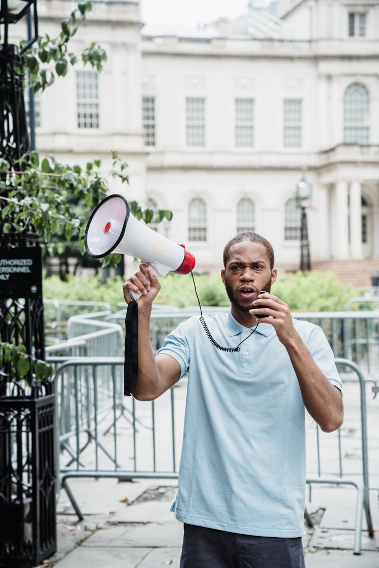 Protester Holding A Megaphone 