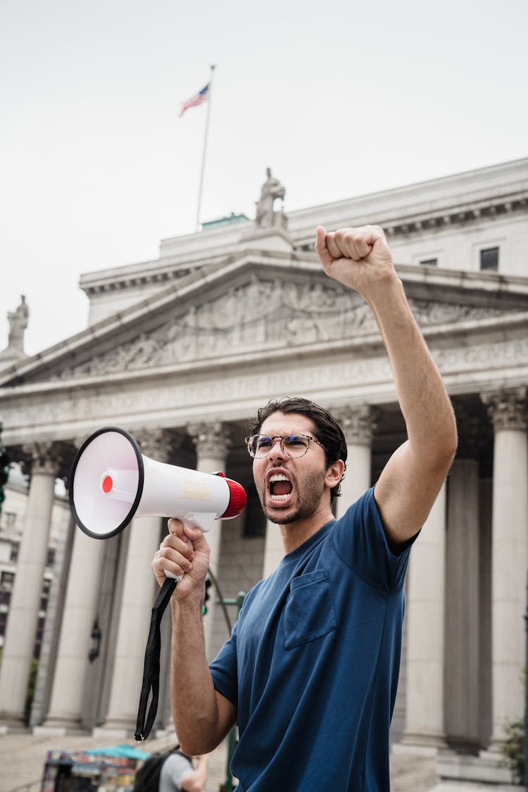 Protester Holding A Megaphone