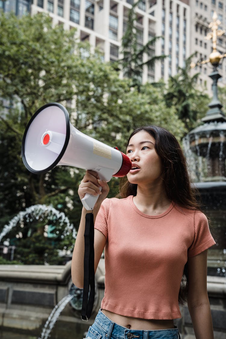 Woman Using A Megaphone