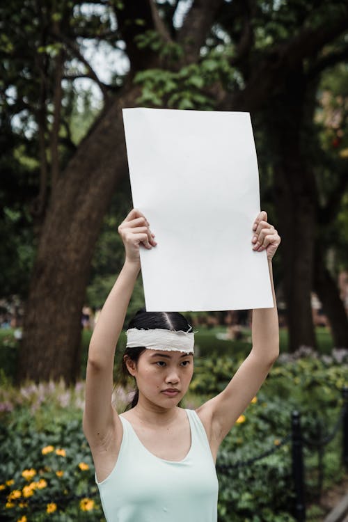 Man holding a Blank Cardboard