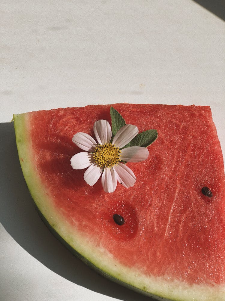 Sliced Watermelon With White Flower