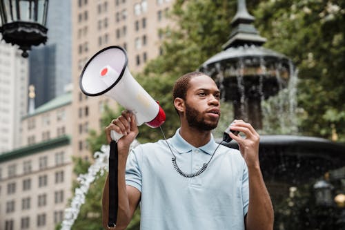 Free Male Protester holding a Megaphone  Stock Photo