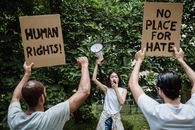 Protesters holding Placards