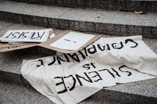 Protest Banners Lying on Steps 