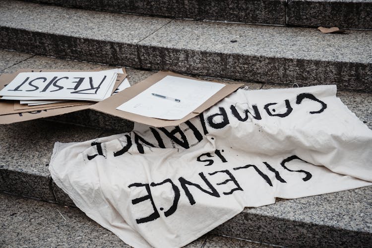 Protest Banners Lying On Steps 