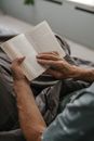 Person Holding Open Book
