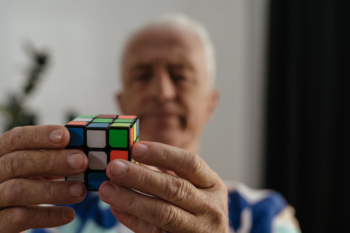 Senior person playing a brain puzzle game