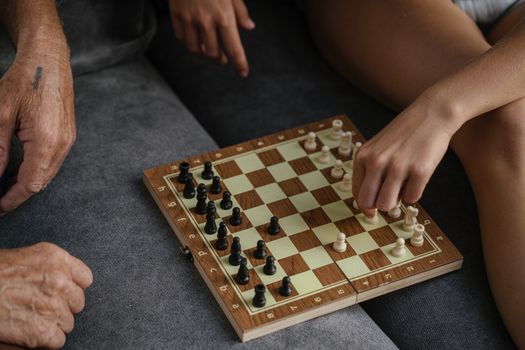 Intense game of chess being played with focus on strategy and skill.