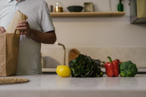 Groceries unpacked on a kitchen counter — SHVETS production on Pexels