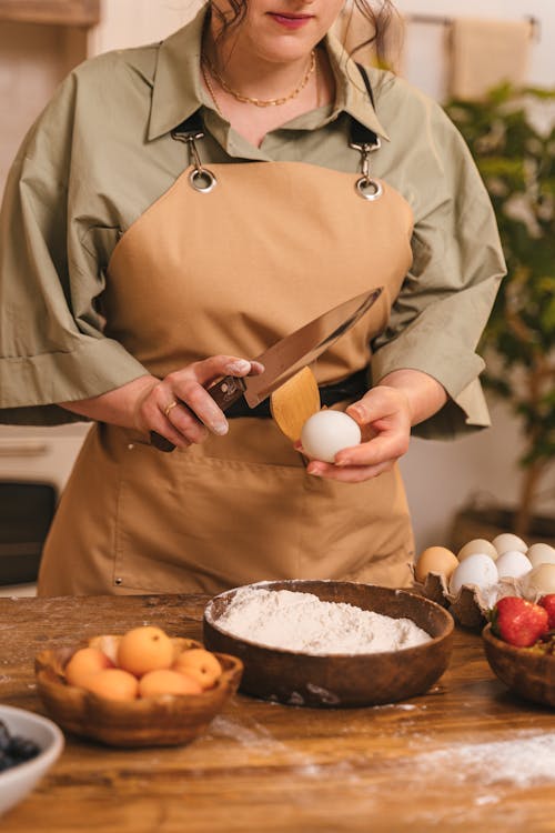 Unrecognizable Woman Cook Cutting Egg Shell 