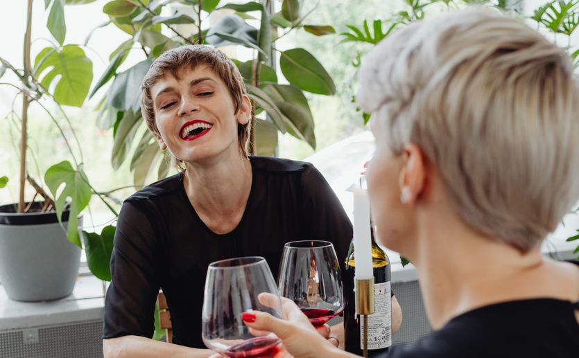 couple smiling at each other on online dating platform