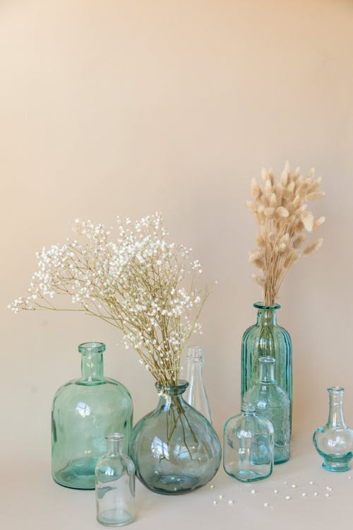 Bottles Recycled as Flower Vases