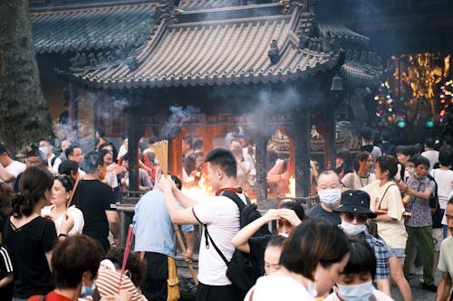 Free People Burning Incense in the Temple Stock Photo