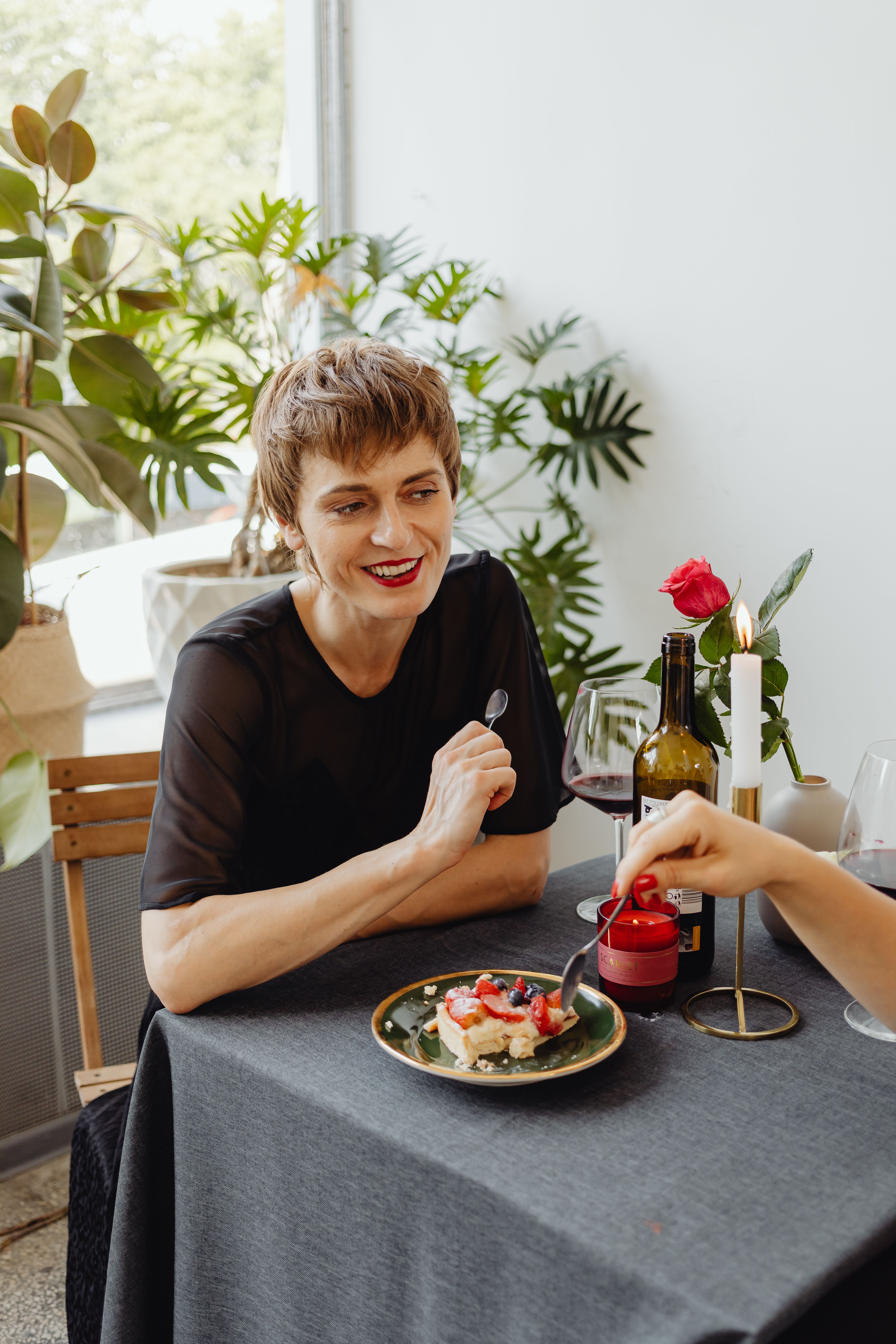 a woman in black dress on a date