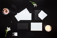 Papers and Envelopes on Black Table