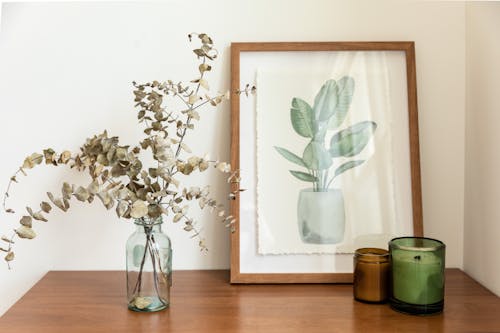 Free Famed Plant Painting over a Wooden Yable Stock Photo