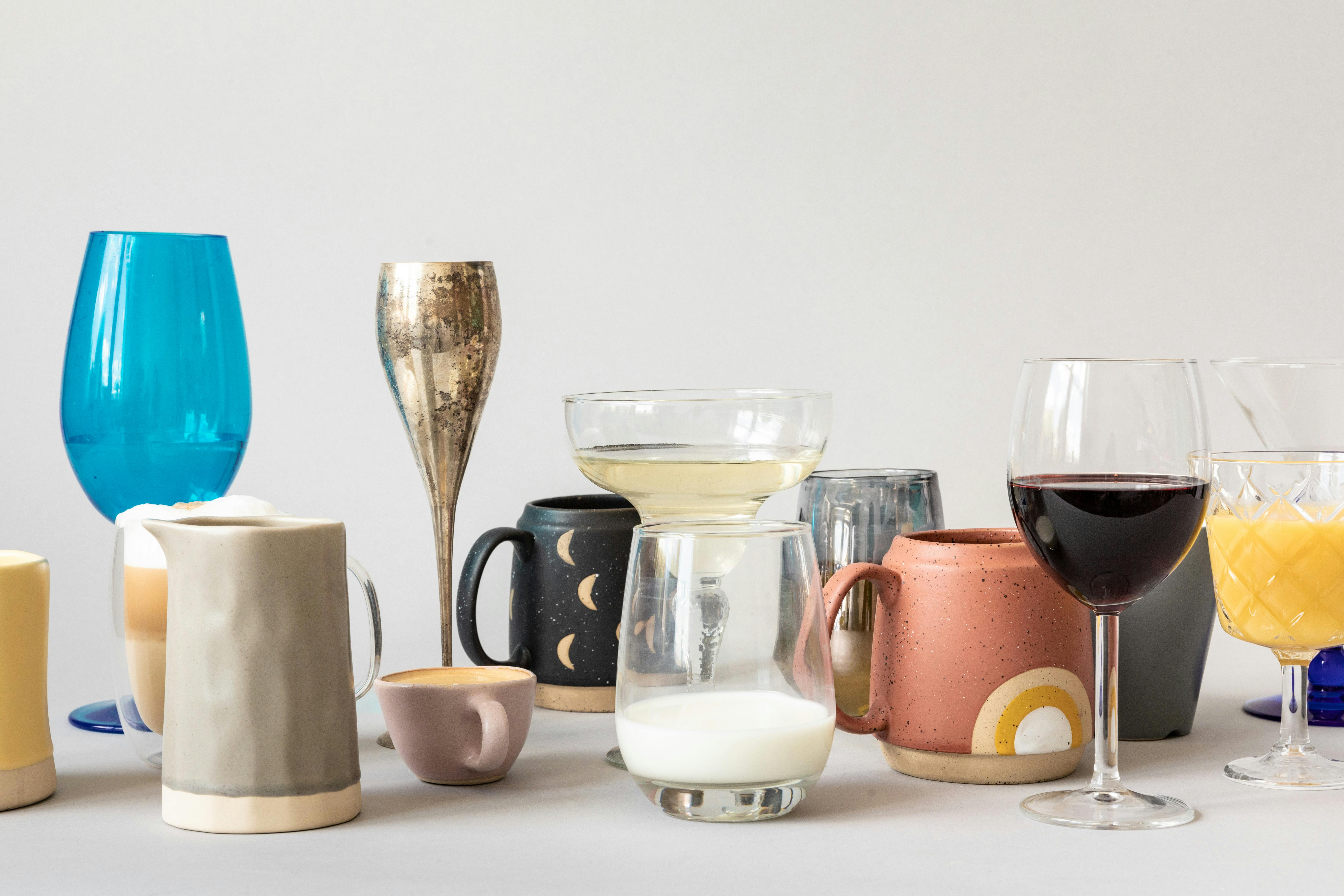 bartender tools with classic tumbler and stemware collection - drinking glass