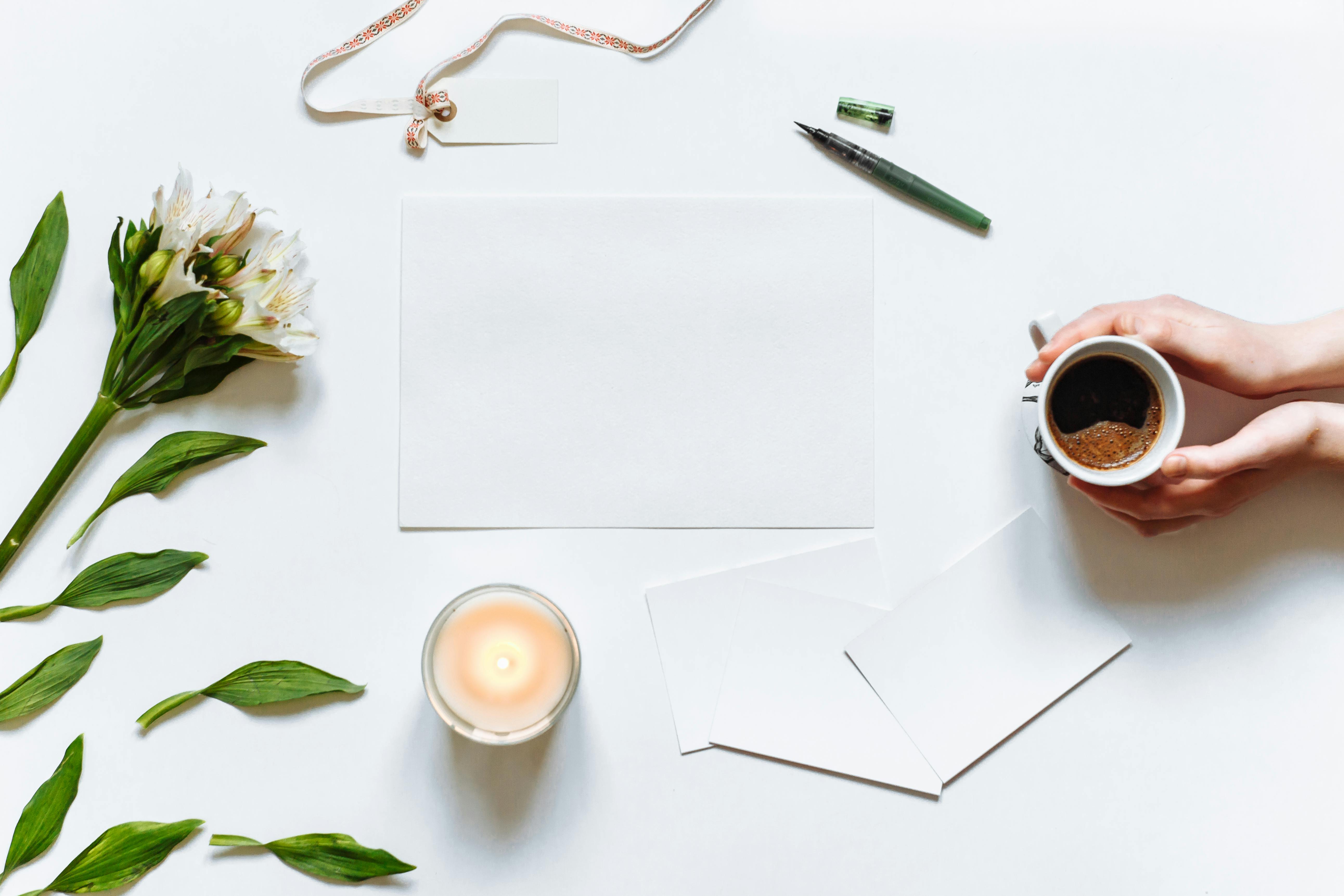 Blank Sheet of Paper, Pen and a Note on a Wooden Tray · Free Stock Photo